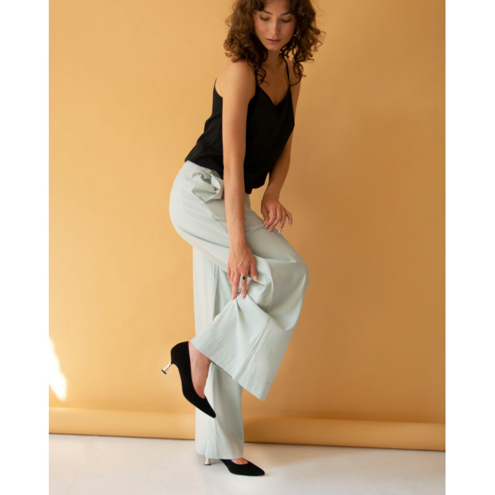 Black suede stilettos with gold heel