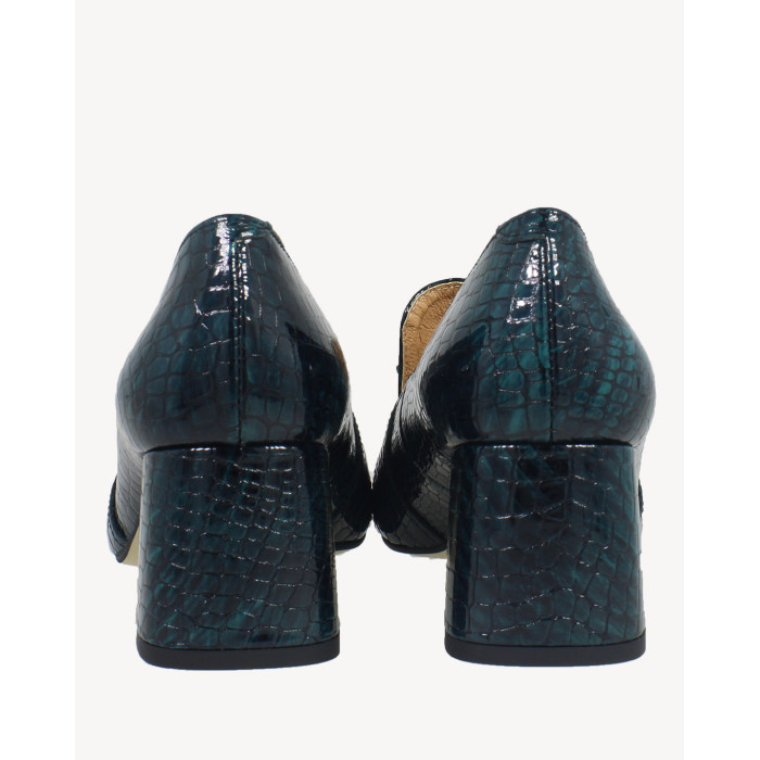 Green moccasins with imitation leather heel