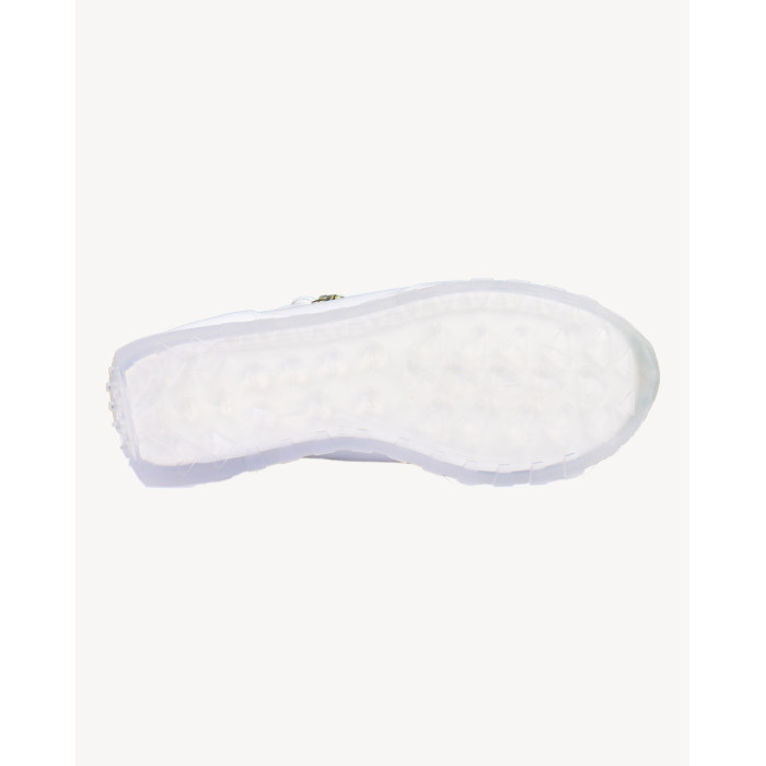 White sports shoes on rubber sole