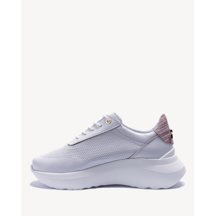 White sports shoes with openwork upper grain leather