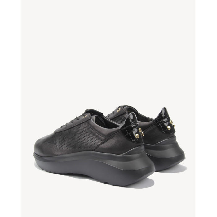 Black sport shoes with openwork upper grain leather