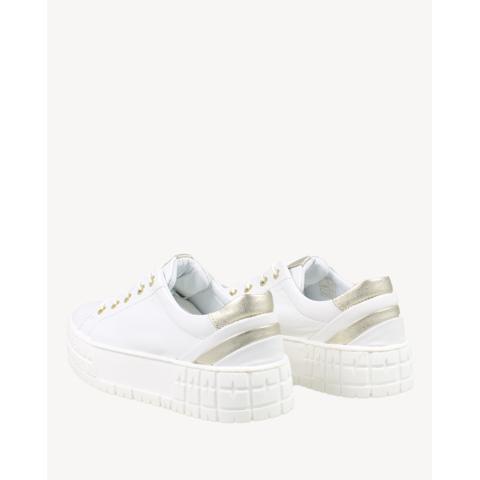 White sneakers on high sole grain leather