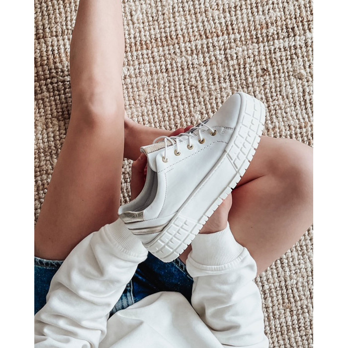 White sneakers on high sole grain leather