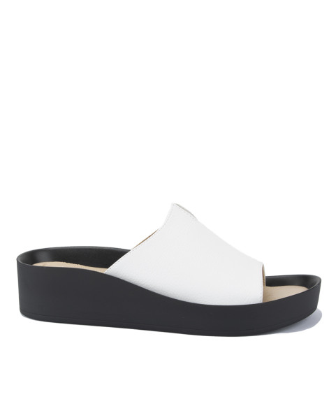 White leather flip-flops on a black sole