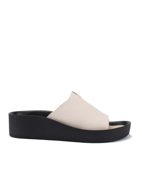 Beige leather flip-flops on black sole