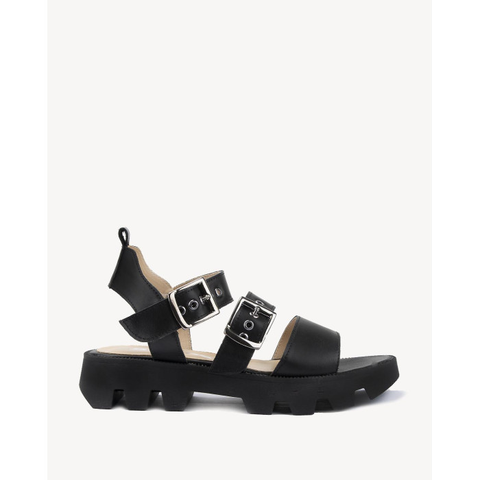 Black leather sandals on a black sole