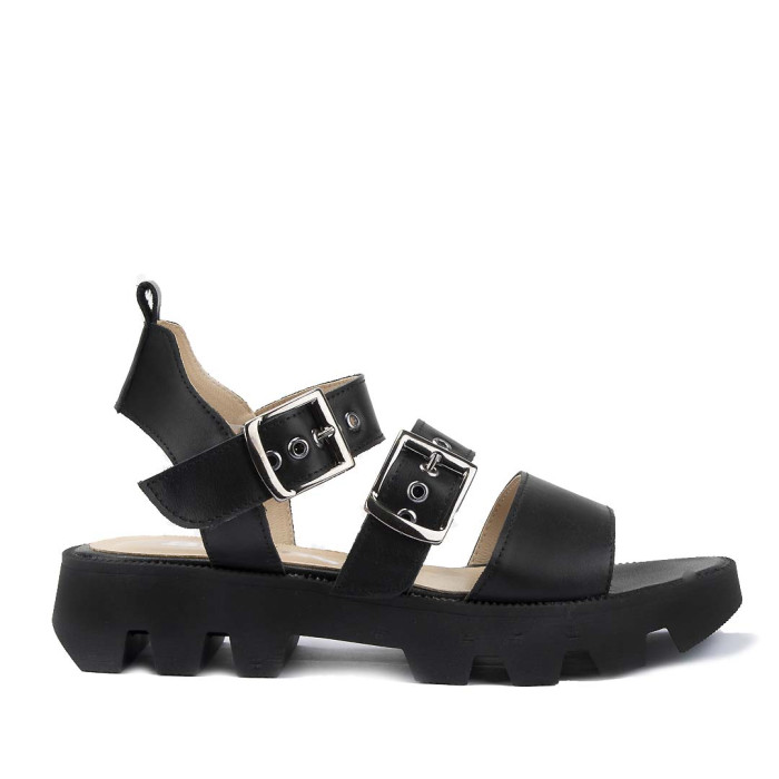 Black leather sandals on a black sole