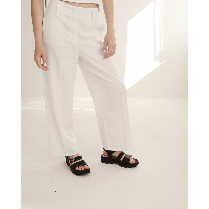 Black leather sandals on a black sole