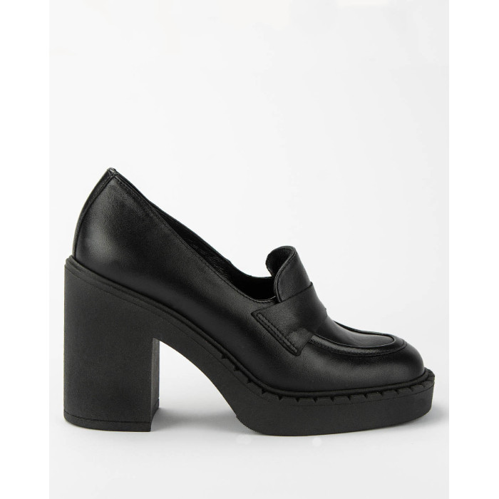 Black leather pumps on a thick sole