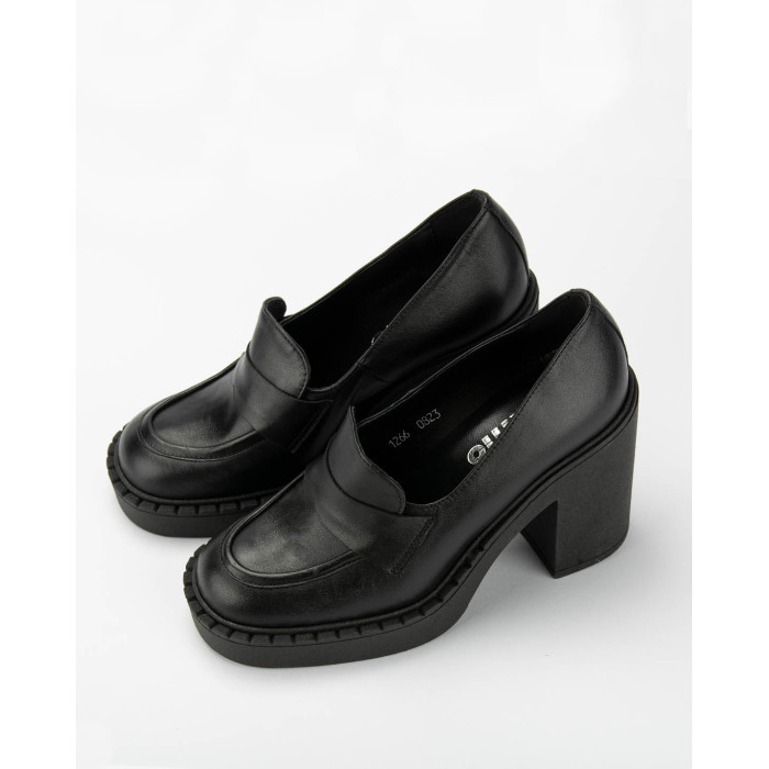 Black leather pumps on a thick sole