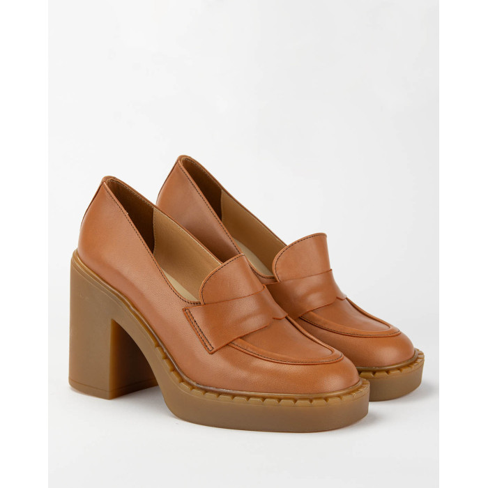 Red leather pumps on a thick sole