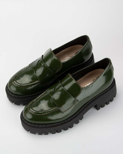 Green leather moccasin on...