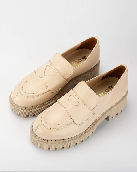 Beige leather moccasin on...