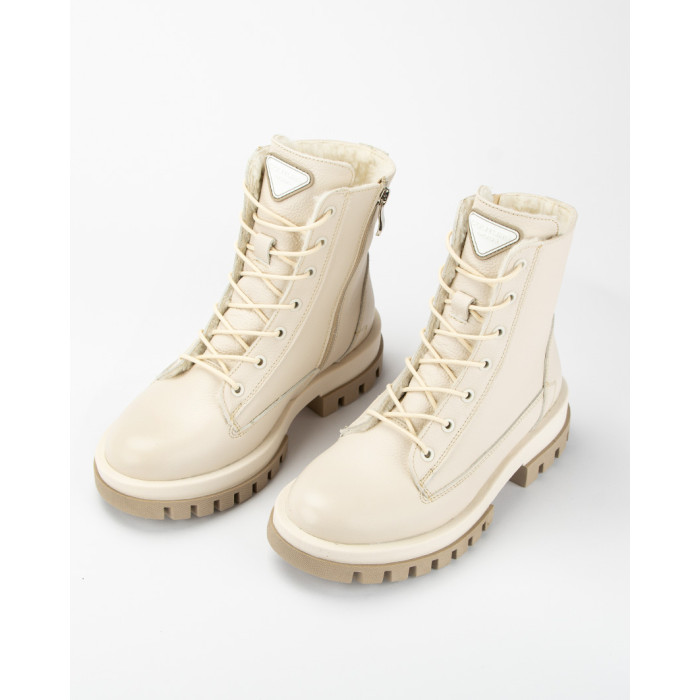 Beige, insulated leather boots on a platform