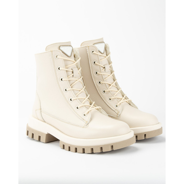 Beige, insulated leather boots on a platform