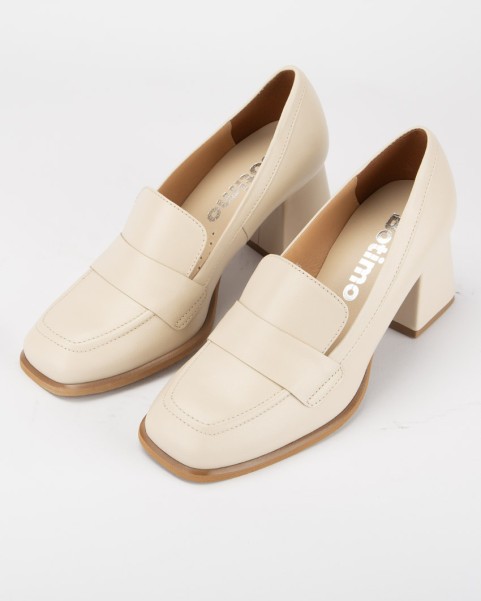 Beige leather pumps with...