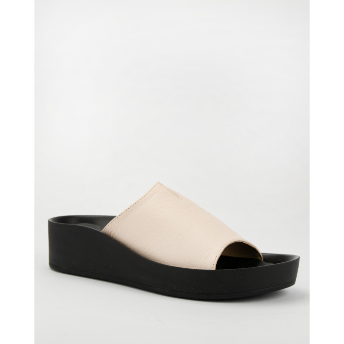 Beige leather flip-flops on black sole