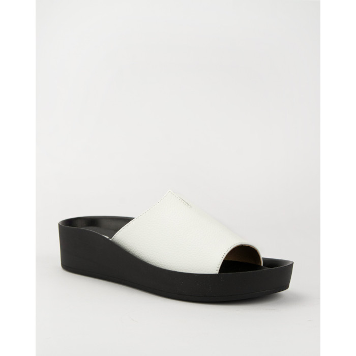 White leather flip-flops on a black sole