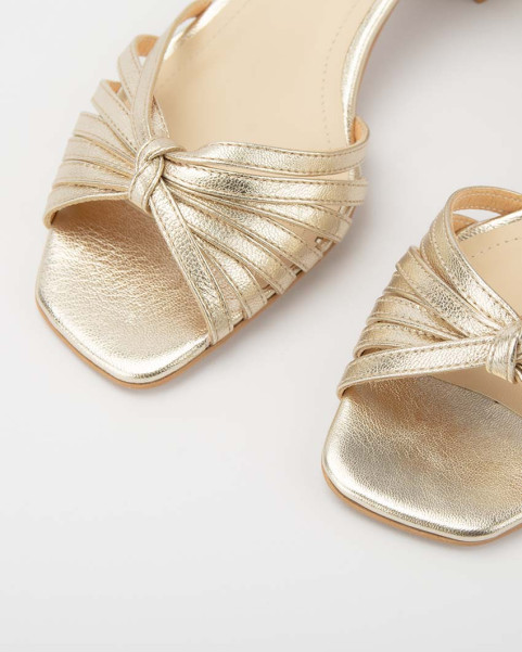 Gold sandals with low heel