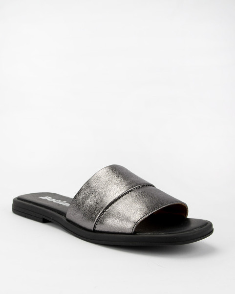 Silver flip-flops on a flat...