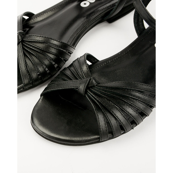 Black sandals on a flat sole