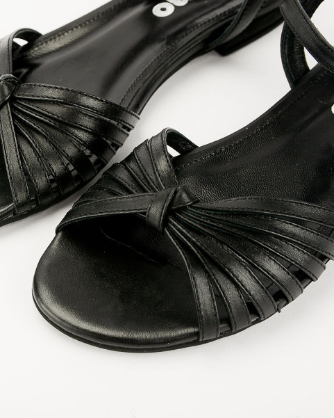 Black sandals on a flat sole