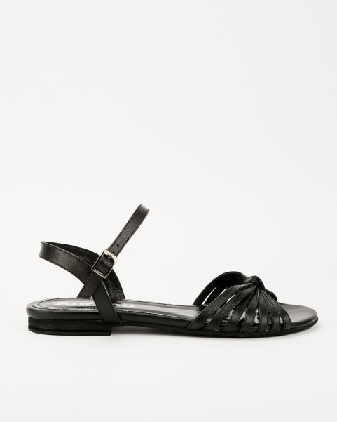 Black sandals on a flat sole